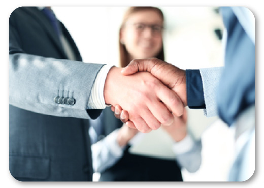 Shaking hands after making a deal