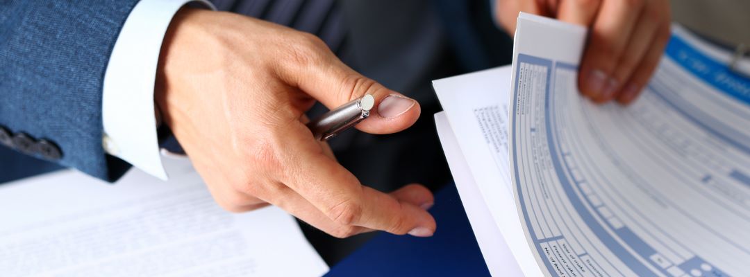 Person going through forms.