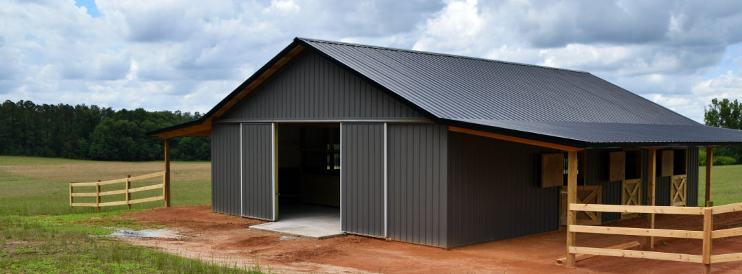 Picture of a Pole Barn in an open field.