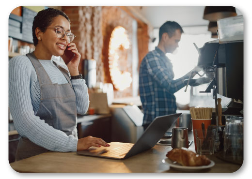 Business Manager of a cafe on the phone