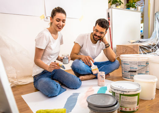 Happy couple painting